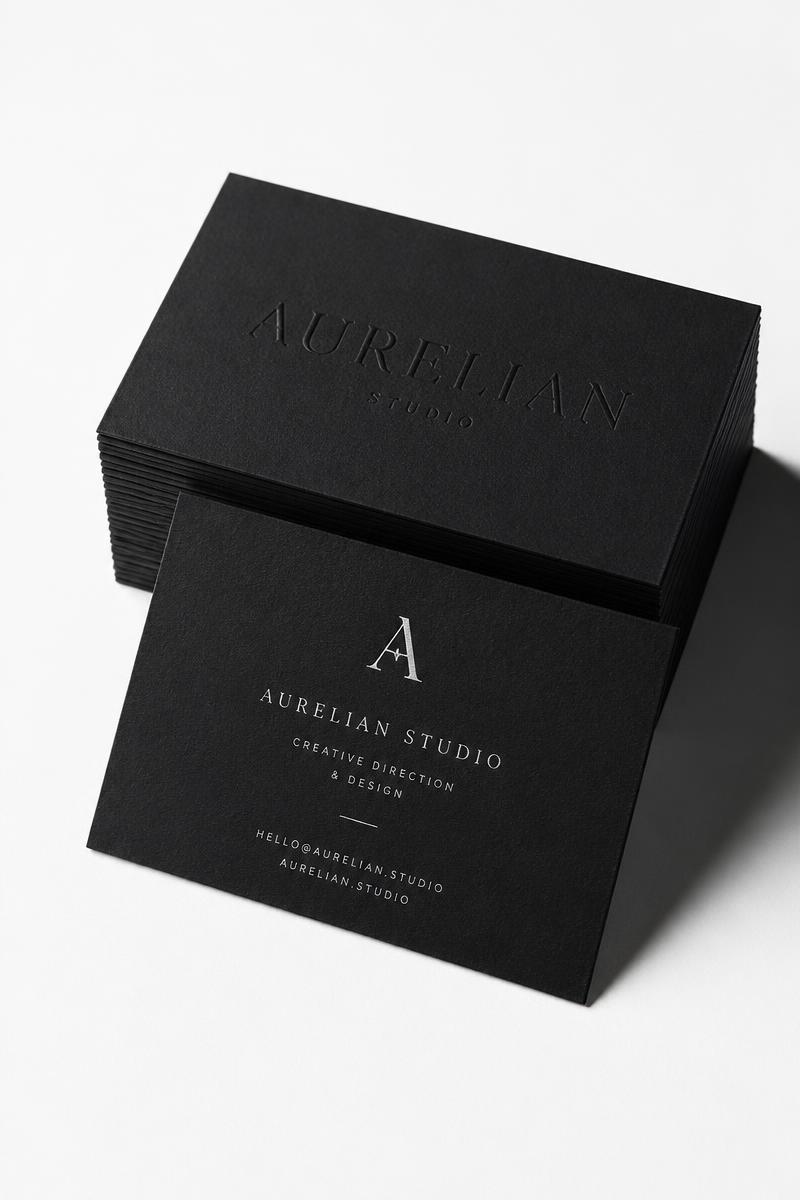 Embossed matte black brand stationery designed by Zero